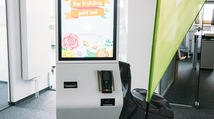 Self-service kiosk terminal with touchscreen, card terminal and scanner